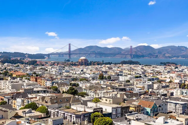 a outdoor living space with furniture and city view