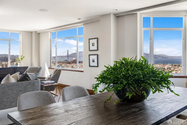 a kitchen with a table and chairs in it