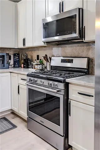 $395,000 | 7216 North Hickory Street, Kansas City, MO 64118