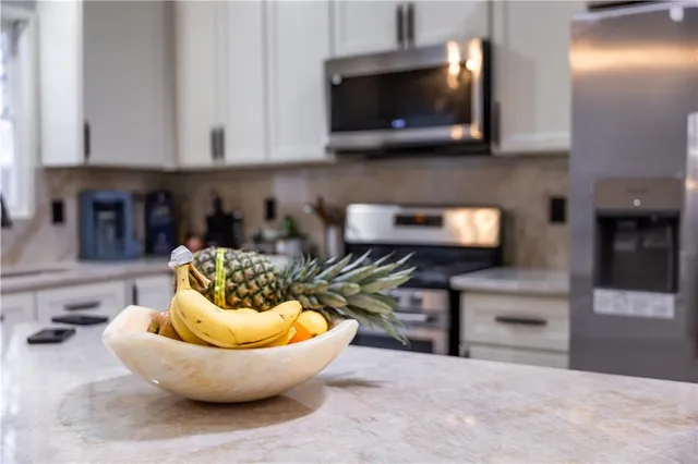 $395,000 | 7216 North Hickory Street, Kansas City, MO 64118