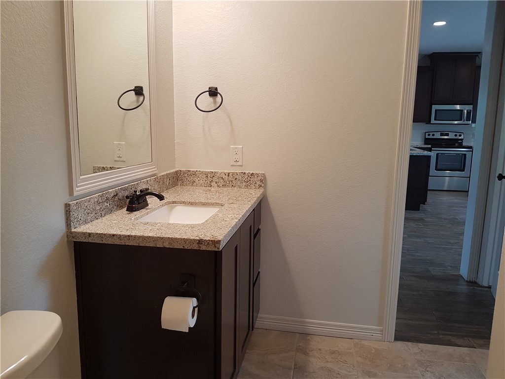 107 Ehlinger Drive Bryan, TX 77801 - Photo 15 of 50 a utility room with sink dryer and washer