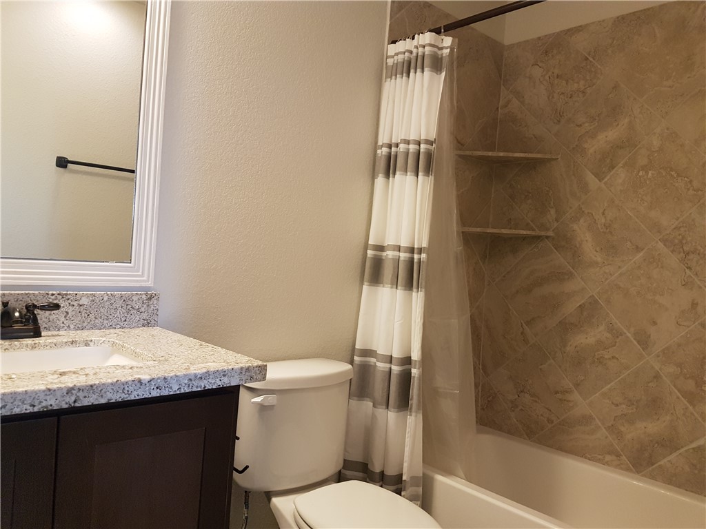 107 Ehlinger Drive Bryan, TX 77801 - Photo 39 of 50 a bathroom with a sink and a toilet