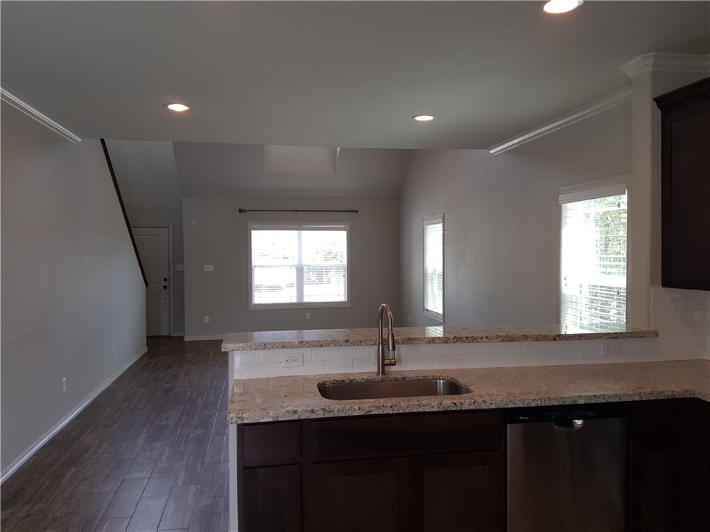107 Ehlinger Drive Bryan, TX 77801 - Photo 7 of 50 a bathroom with a double vanity sink and a mirror