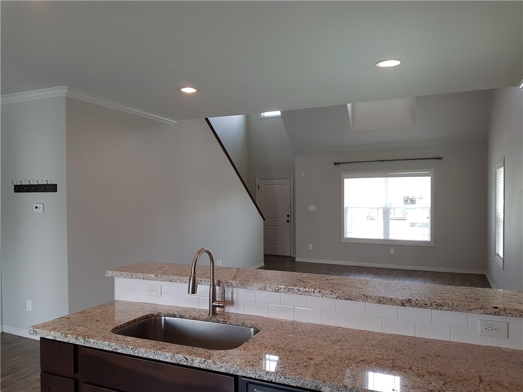 107 Ehlinger Drive Bryan, TX 77801 - Photo 8 of 50 a sink sitting next to a window