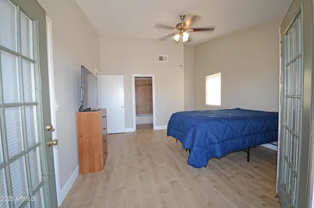 a white bath tub sitting next to a white toilet and sink