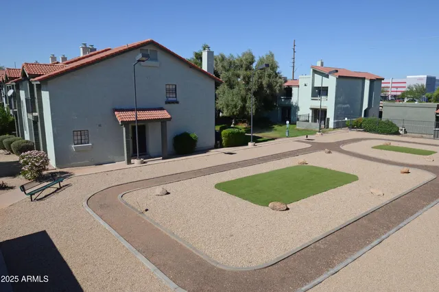 a view of a house with a tree