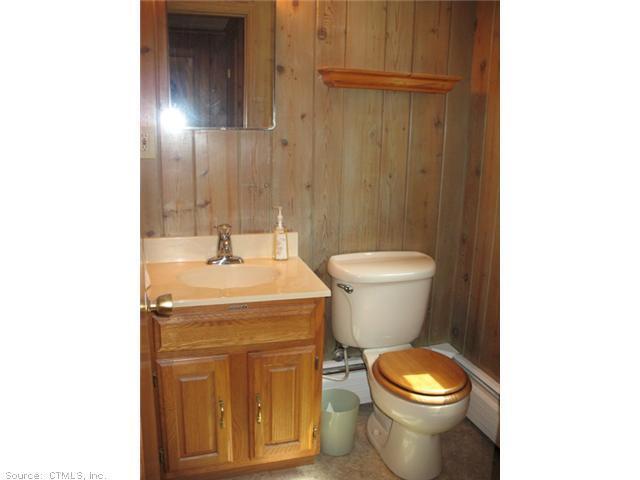 30 Williams Road Bolton, CT 06043 - Photo 1 of 1 a bathroom with a sink a toilet and shower