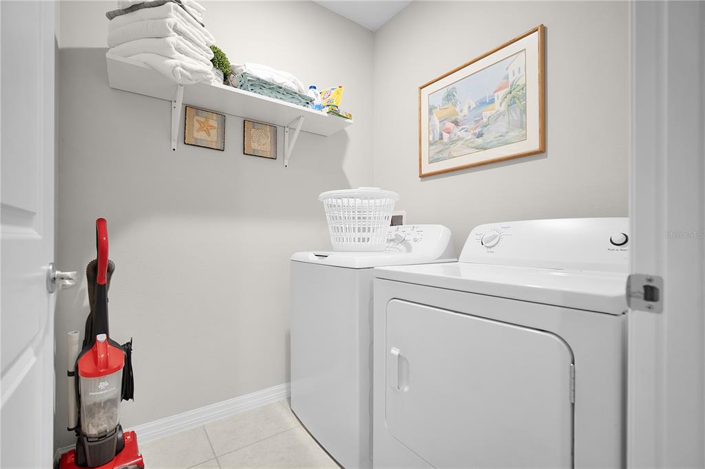 418 Fleming Street Sebastian, FL 32958 - Photo 27 of 38 a utility room with dryer and washer