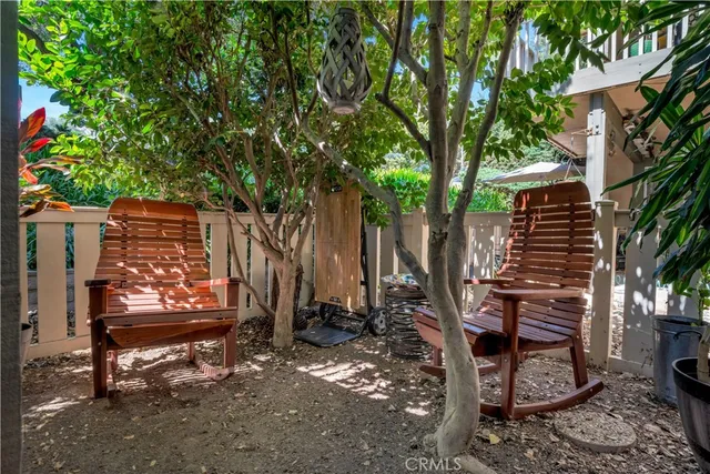 a view of a bench in a backyard