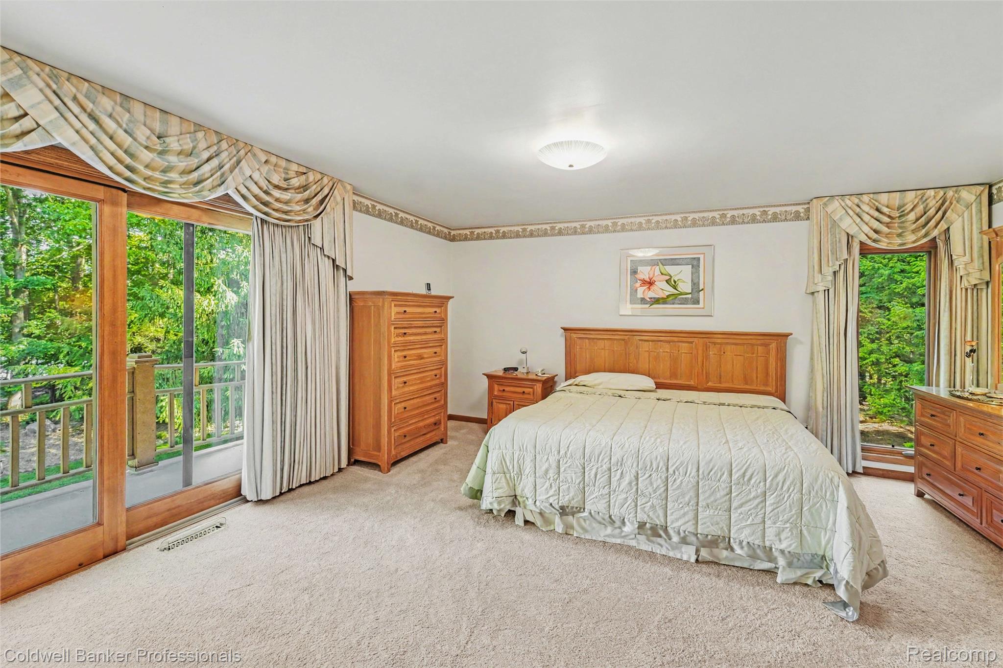 3583 Mitchell Road Metamora, MI 48455 - Photo 32 of 58 Carpeted bedroom with a sliding glass door opening to a private balcony