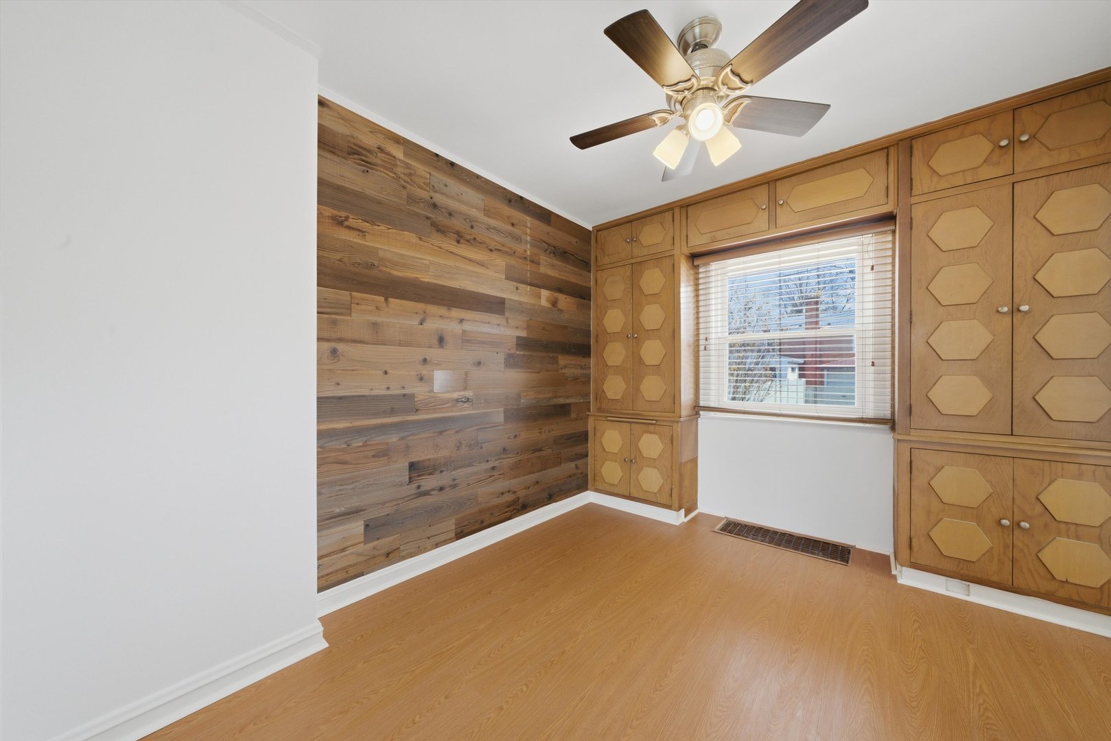 3941 North Mobile Avenue Chicago, IL 60634 - Photo 14 of 46 a view of an empty room with a window
