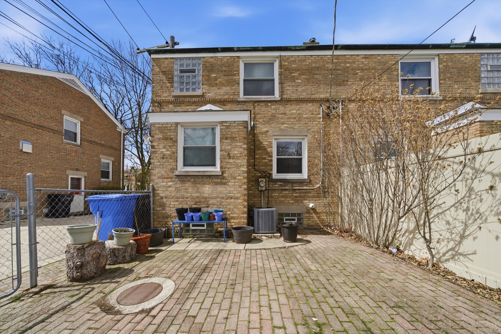 3941 North Mobile Avenue Chicago, IL 60634 - Photo 39 of 46 a view of a brick house with many windows