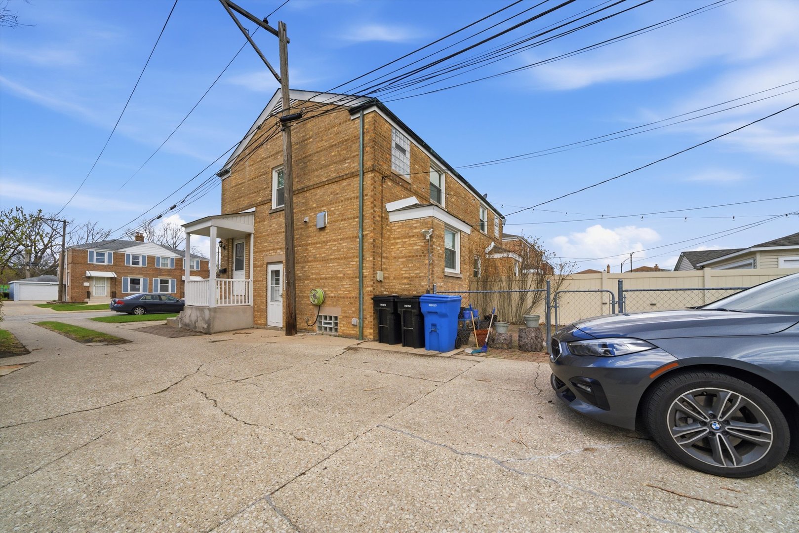 3941 North Mobile Avenue Chicago, IL 60634 - Photo 41 of 46 a blue car parked in front of a building