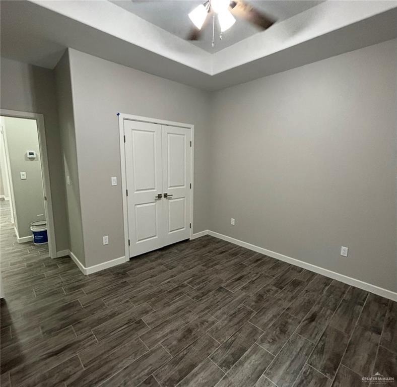 401 Bertha Avenue, Unit 2 Mission, TX 78572 - Photo 9 of 13 wooden floor in an empty room