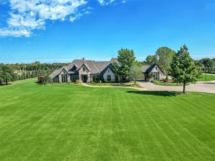 a view of a house with a park