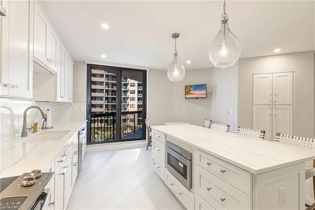 a bathroom with a sink double vanity and a shower