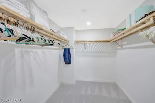 a view of staircase with white walls