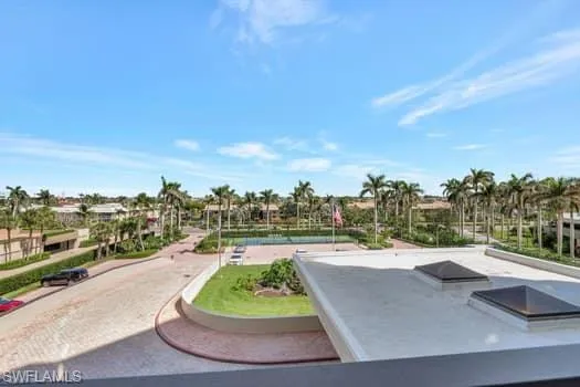 a view of a street with a houses