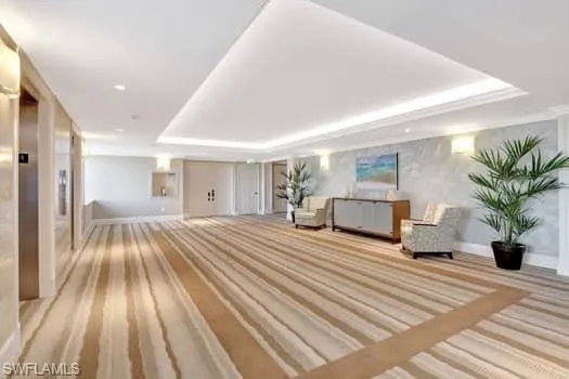 a bedroom with a large bed and a large window