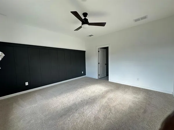 a view of a livingroom with furniture and window
