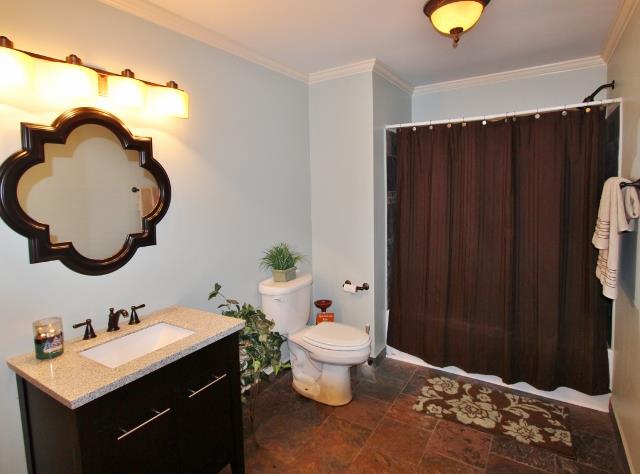 7150 Franklin Road Lebanon, TN 37090 - Photo 15 of 20 hall bathroom with shower/tub combo and tile flooring