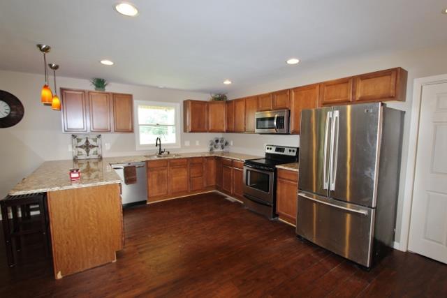 7150 Franklin Road Lebanon, TN 37090 - Photo 6 of 20 "U" shaped kitchen with stainless steel appliances, granite, breakfast bar and open layout
