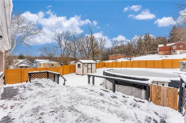 a view of a house with roof deck
