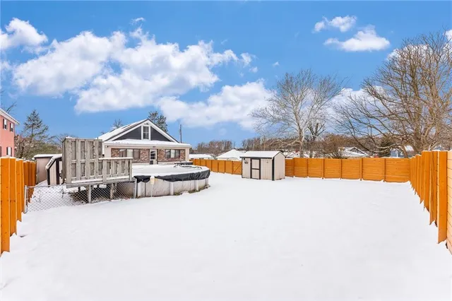 a front view of a house with wooden stairs