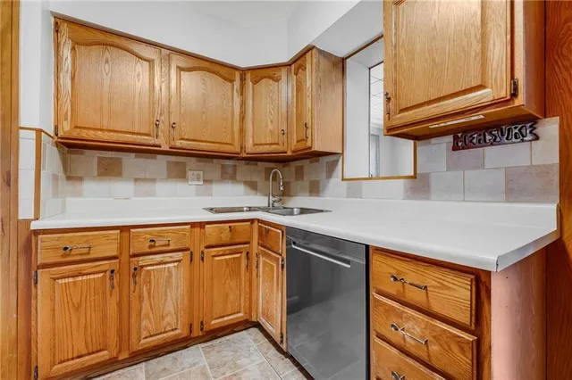 a view of a hallway with wooden shelves