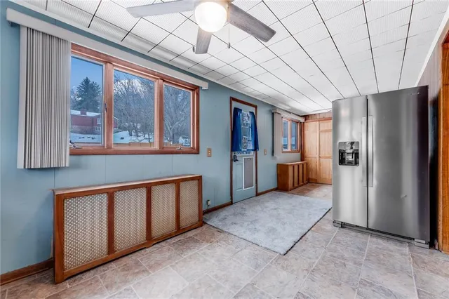 a view of a hallway with washer and dryer