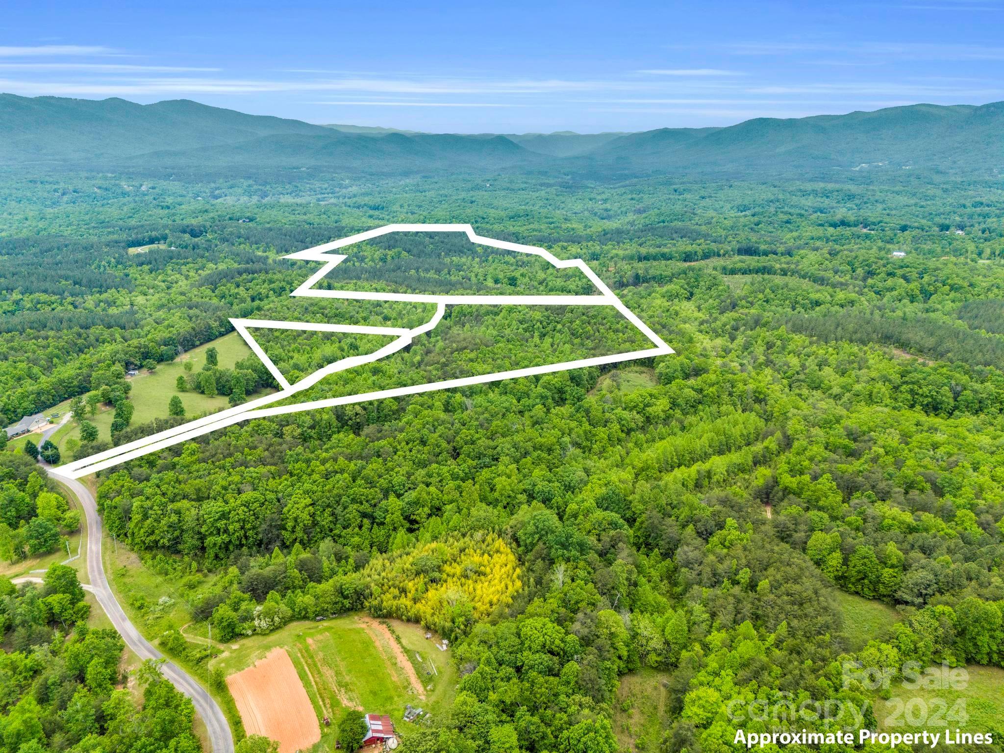 0 Henry Ruff Rd Mill Spring, Unit LOT 2 Mill Spring, NC 28756 - Photo 11 of 13 a view of a tennis court