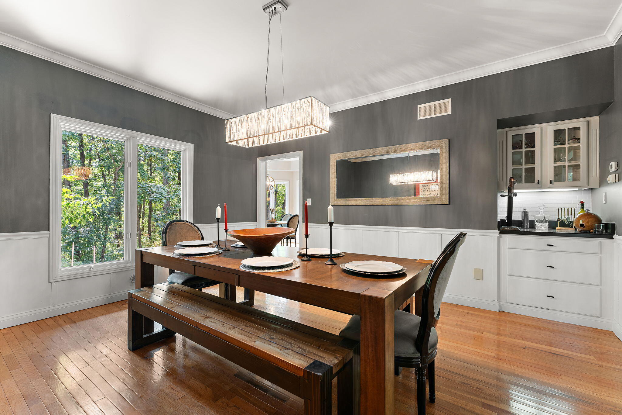 12275 South Williams Court Crown Point, IN 46307 - Photo 11 of 67 a view of a dining room with furniture window and wooden floor
