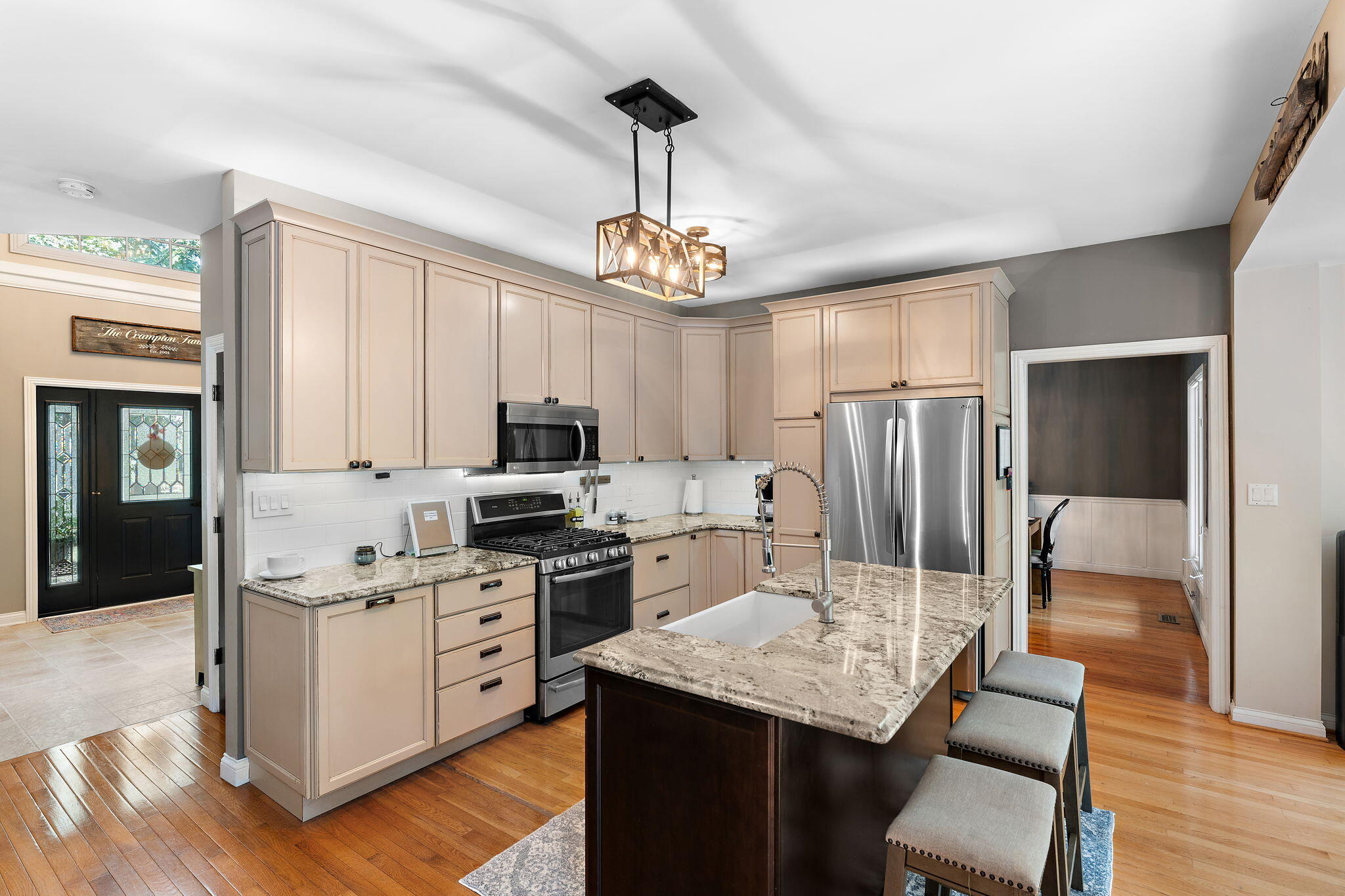 12275 South Williams Court Crown Point, IN 46307 - Photo 12 of 67 a kitchen that has a lot of cabinets in it and stainless steel appliances
