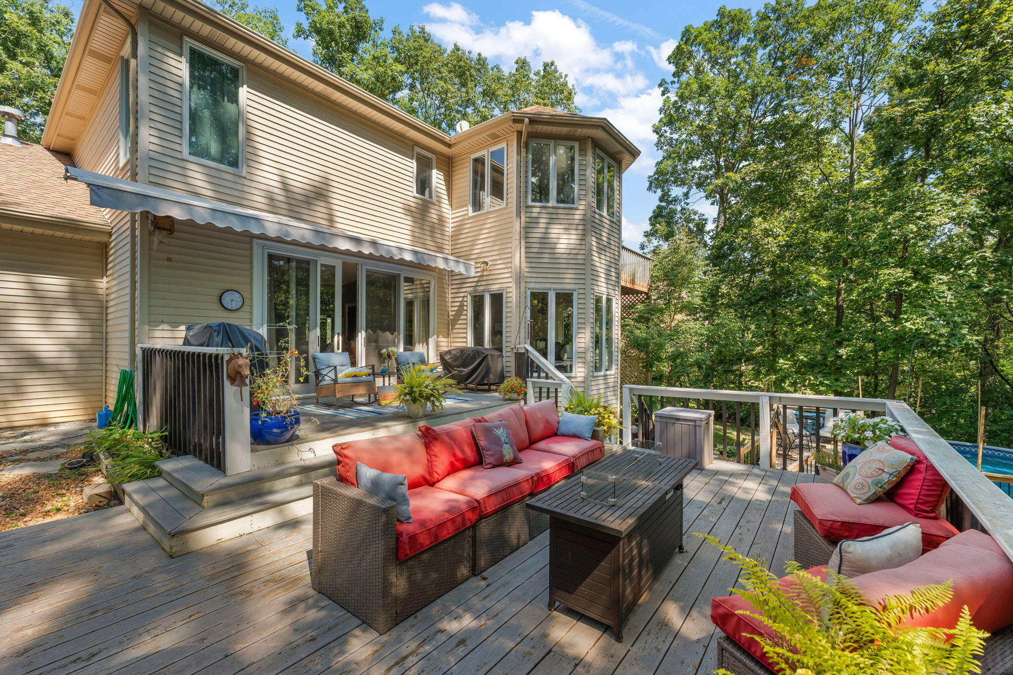 12275 South Williams Court Crown Point, IN 46307 - Photo 23 of 67 a view of a patio with couches table and chairs and potted plants