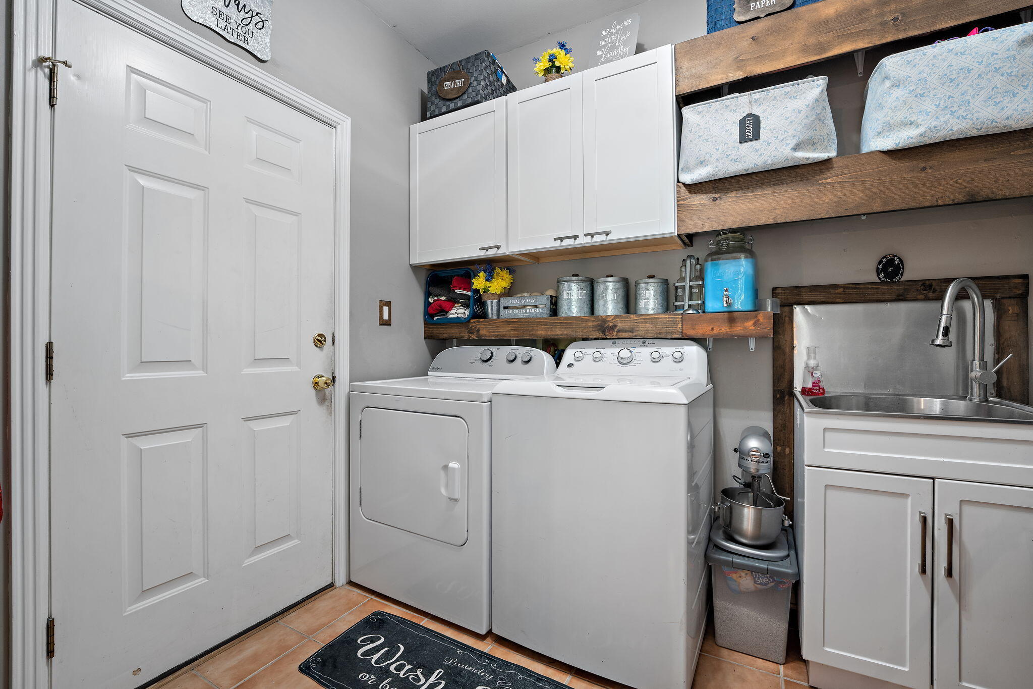 12275 South Williams Court Crown Point, IN 46307 - Photo 25 of 67 a utility room with cabinets washer and dryer