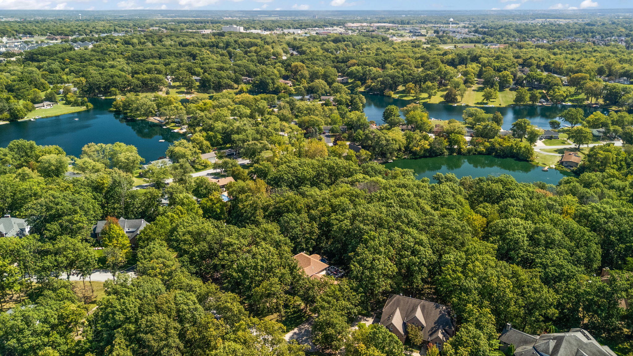 12275 South Williams Court Crown Point, IN 46307 - Photo 63 of 67 a view of a lake with a city