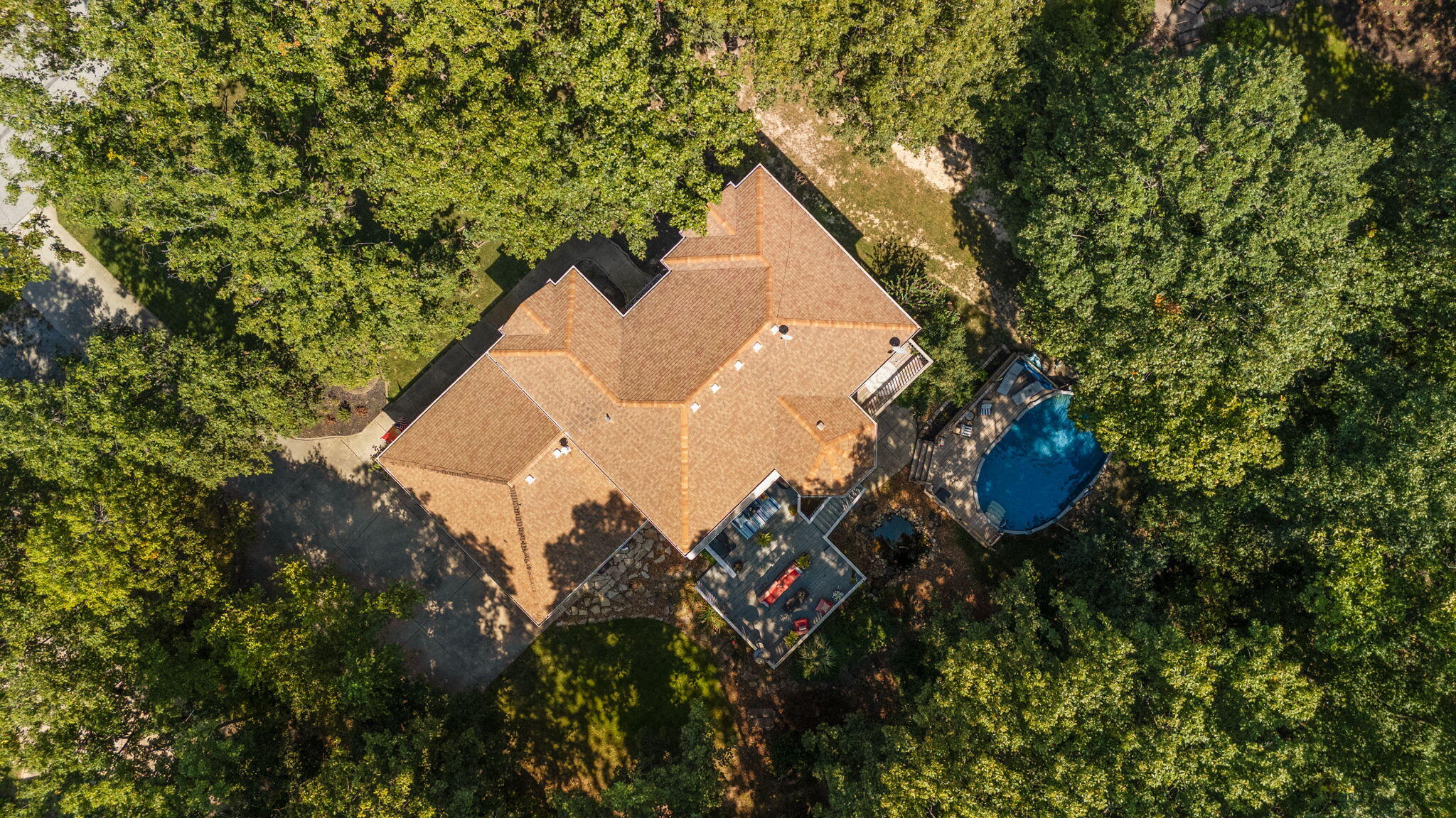 12275 South Williams Court Crown Point, IN 46307 - Photo 64 of 67 an aerial view of a house with a yard and trees all around