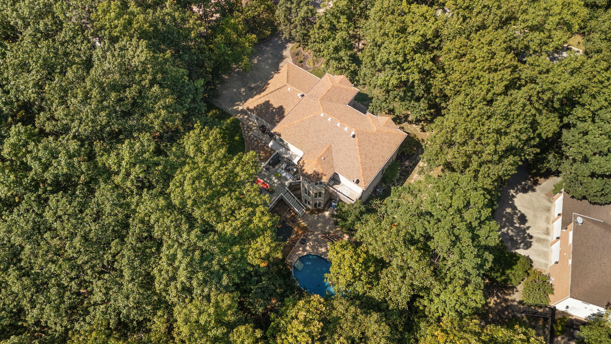 12275 South Williams Court Crown Point, IN 46307 - Photo 65 of 67 an aerial view of a house with a yard and covered with trees