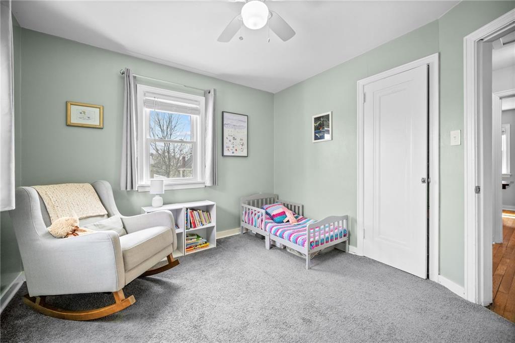 416 Phillips Avenue McKees Rocks, PA 15136 - Photo 26 of 46 a living room with a baby crib furniture and a window