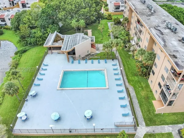 an aerial view of house with yard