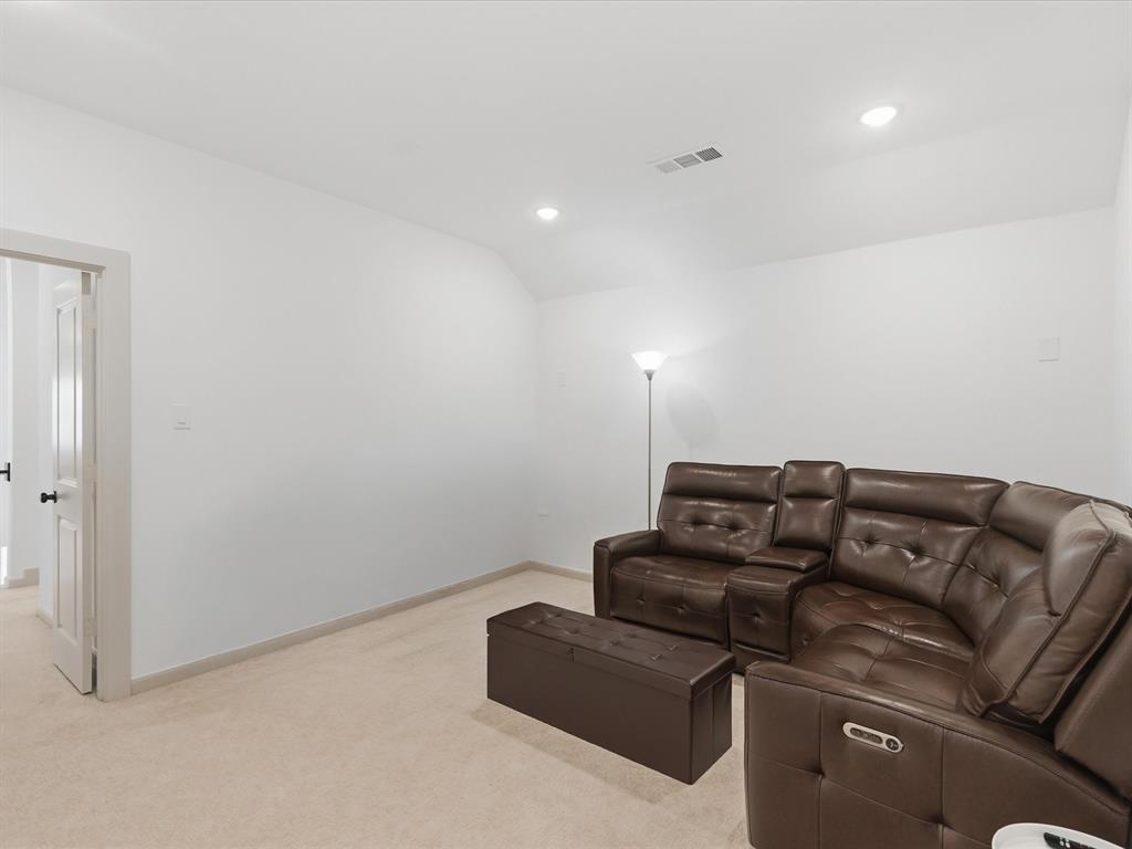 9533 Keep Street Frisco, TX 75035 - Photo 33 of 40 Carpeted room with recessed lighting and a white paneled door