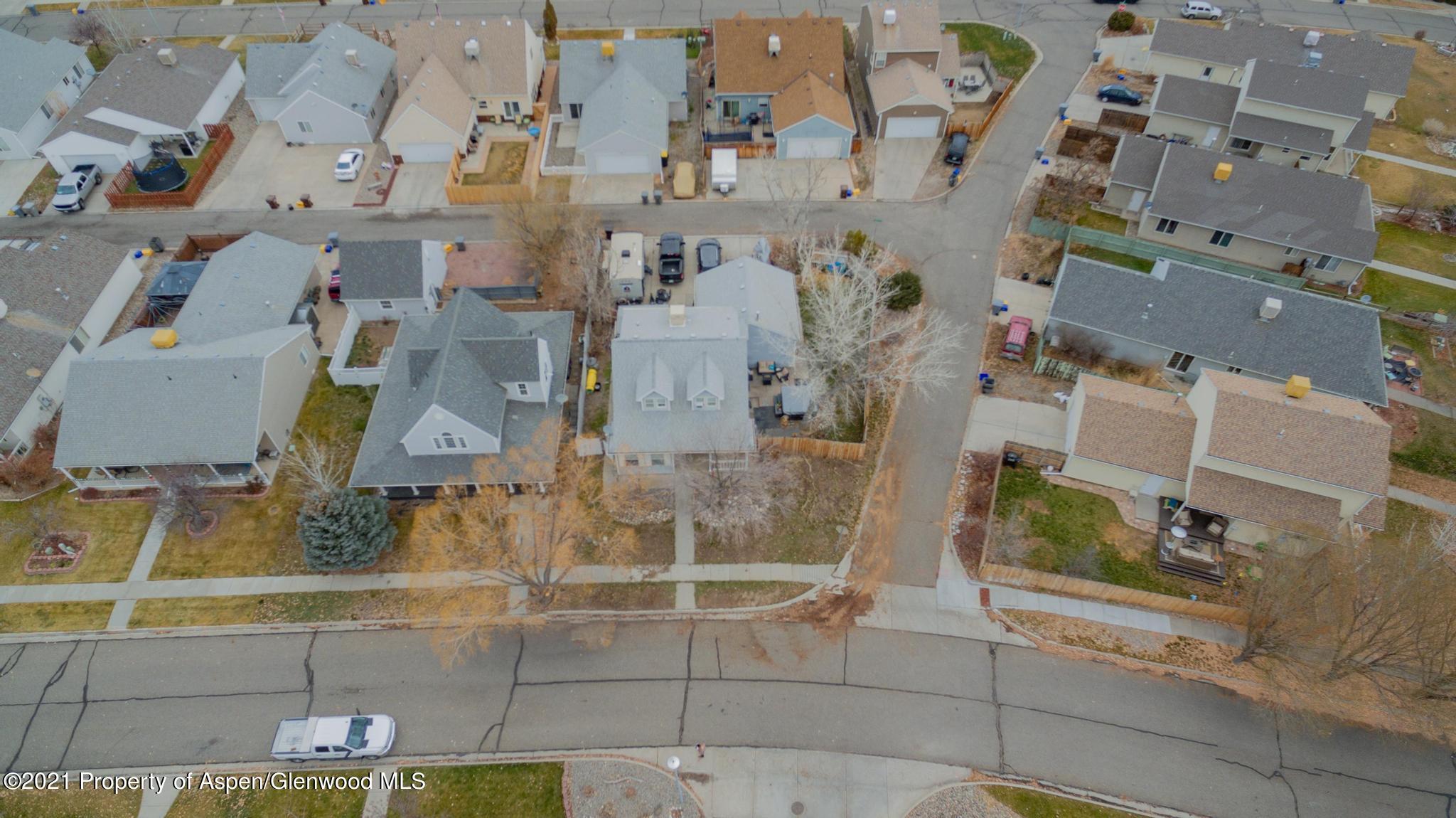 452 Evergreen Drive Rifle, CO 81650 - Photo 22 of 22 an aerial view of residential houses with outdoor space