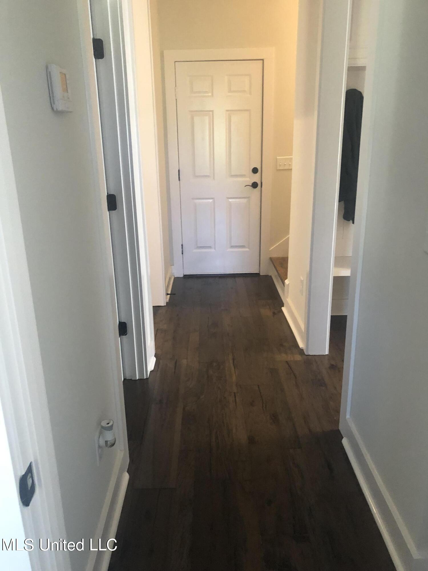 163 Stump Ridge Road Brandon, MS 39047 - Photo 15 of 36 Hallway from Master to Garage - Copy