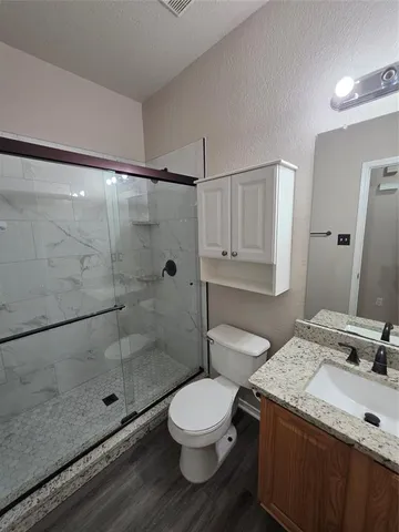 a bathroom with a sink and a shower