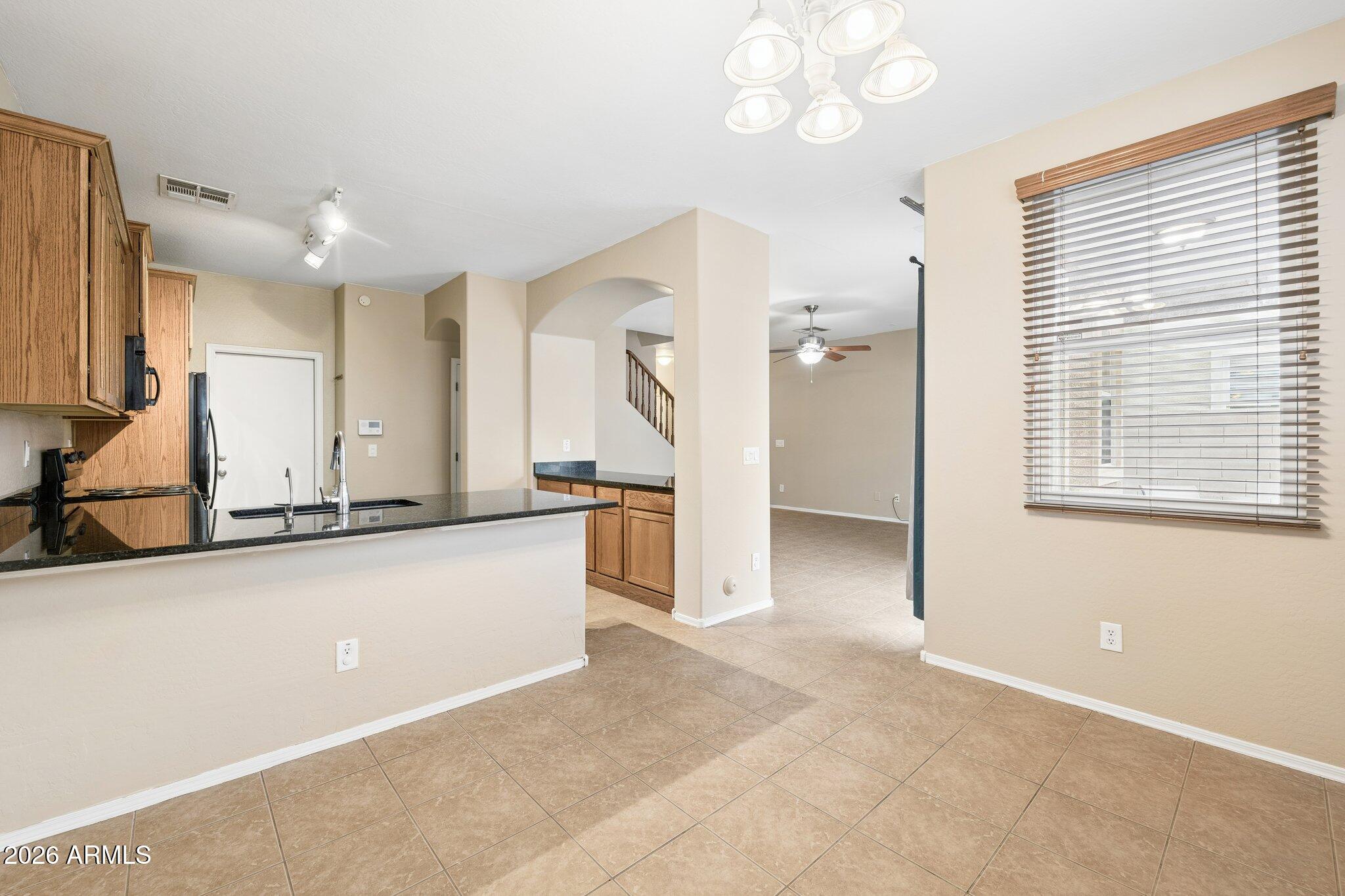 2226 East Fraktur Road Phoenix, AZ 85040 - Photo 8 of 68 Dining room adjacent to kitchen