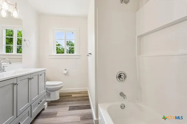 a view of a room that has a window in it