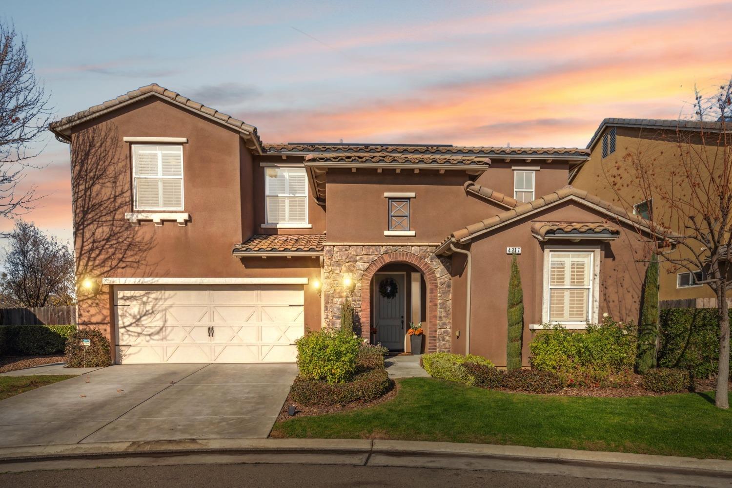 4217 Salem Lane Clovis, CA 93619 - Photo 1 of 57 a front view of a house with a yard