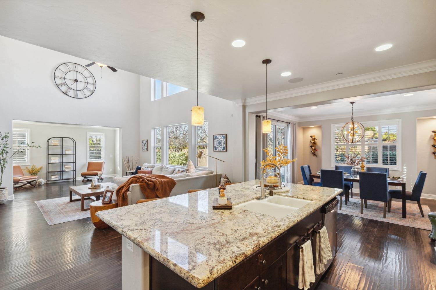4217 Salem Lane Clovis, CA 93619 - Photo 11 of 57 a view of a dining room with furniture window and wooden floor