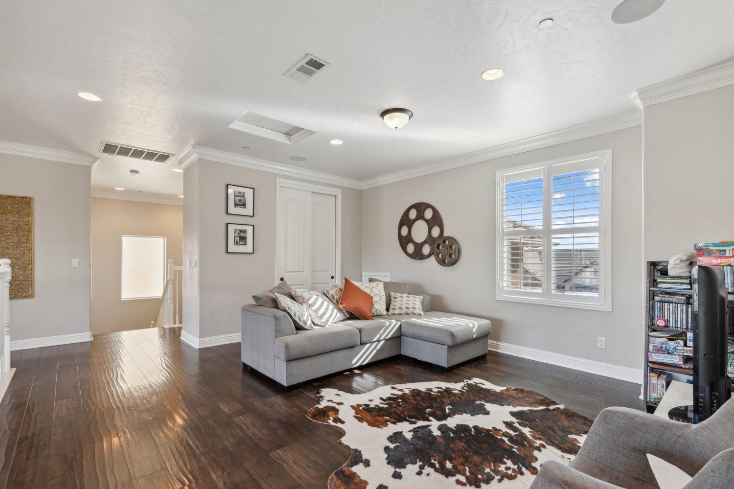 4217 Salem Lane Clovis, CA 93619 - Photo 25 of 57 a living room with furniture and a window