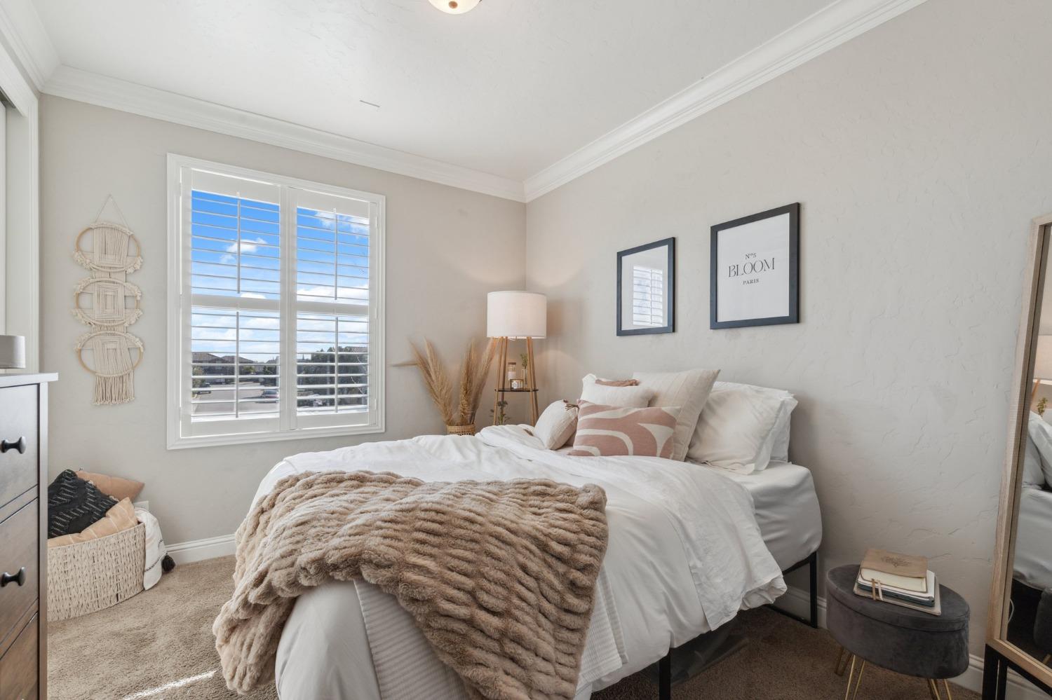 4217 Salem Lane Clovis, CA 93619 - Photo 27 of 57 a bed room with a bed and a window